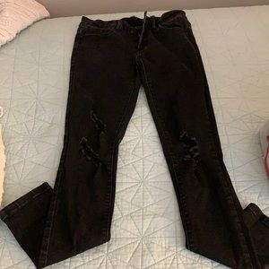 Size 27 Black ripped skinny jeans.